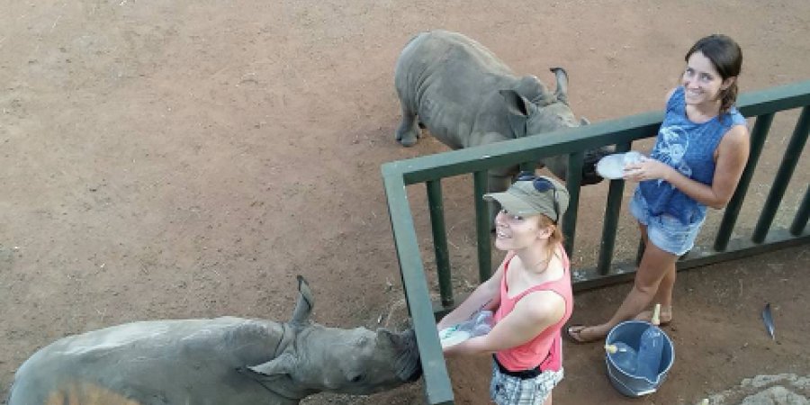 Karina and Jamie feeding rhino orphans Kabelo and Kabira - photos courtesy the rhino orphanage